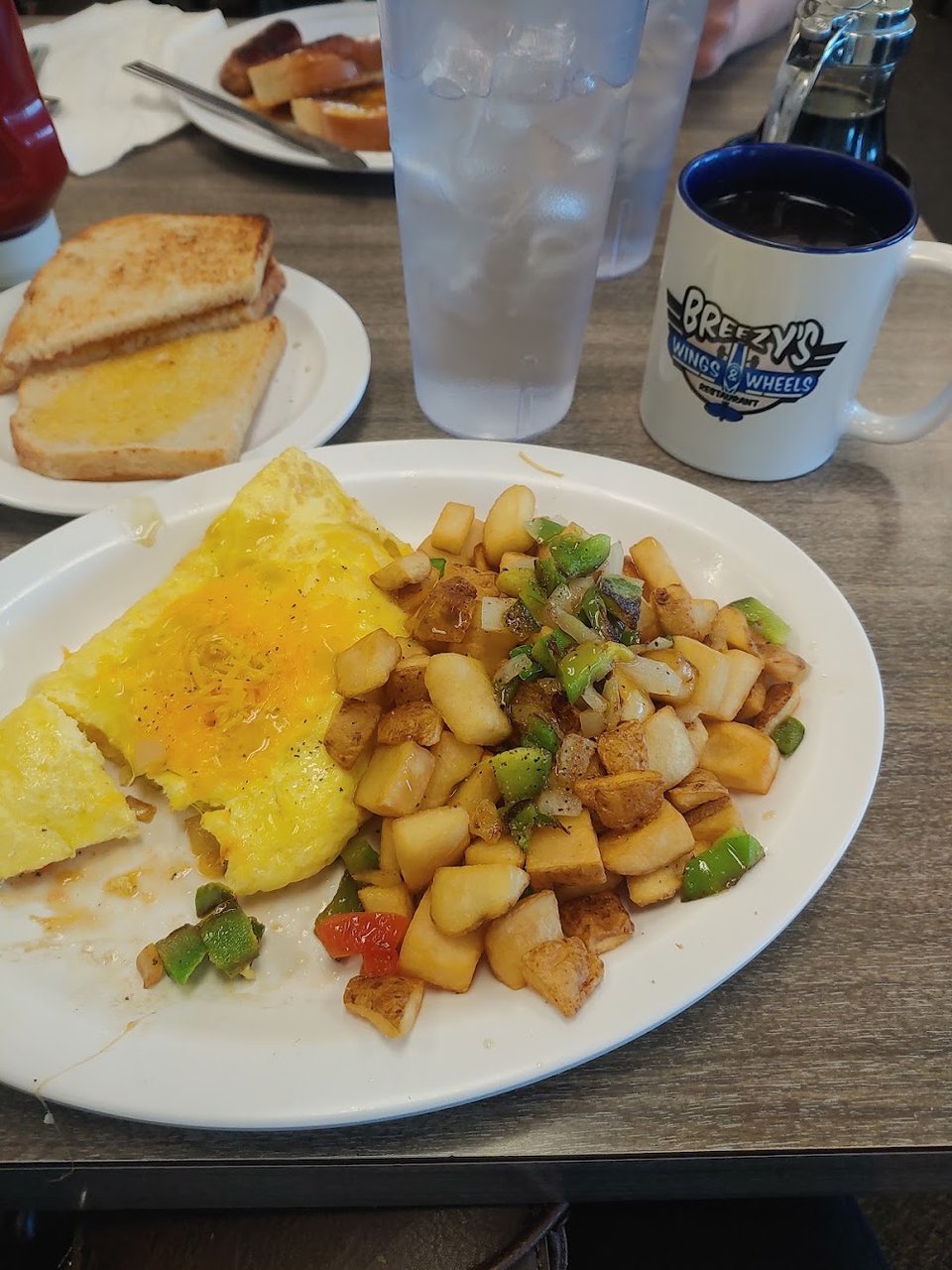 Printed menu with breakfast and lunch sections.