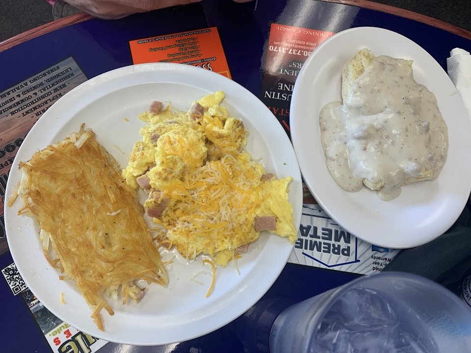 Printed menu with breakfast and lunch sections.